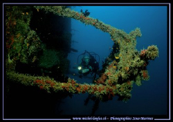My wife looking in a Wreck... :O) ... by Michel Lonfat 